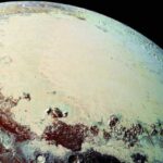 Planetary Researchers Solve Mystery of How Pluto Got Its Pear-Shaped Feature